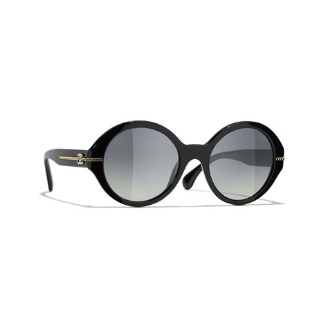 chanel round signature sunglasses black|Chanel round sunglasses with chain.